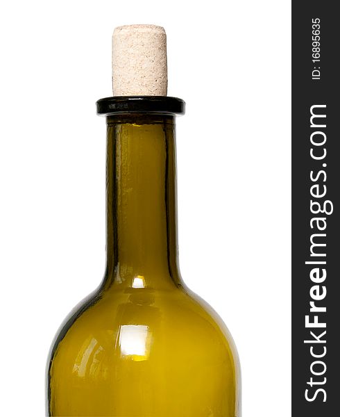 A bottle of green glass on a white background