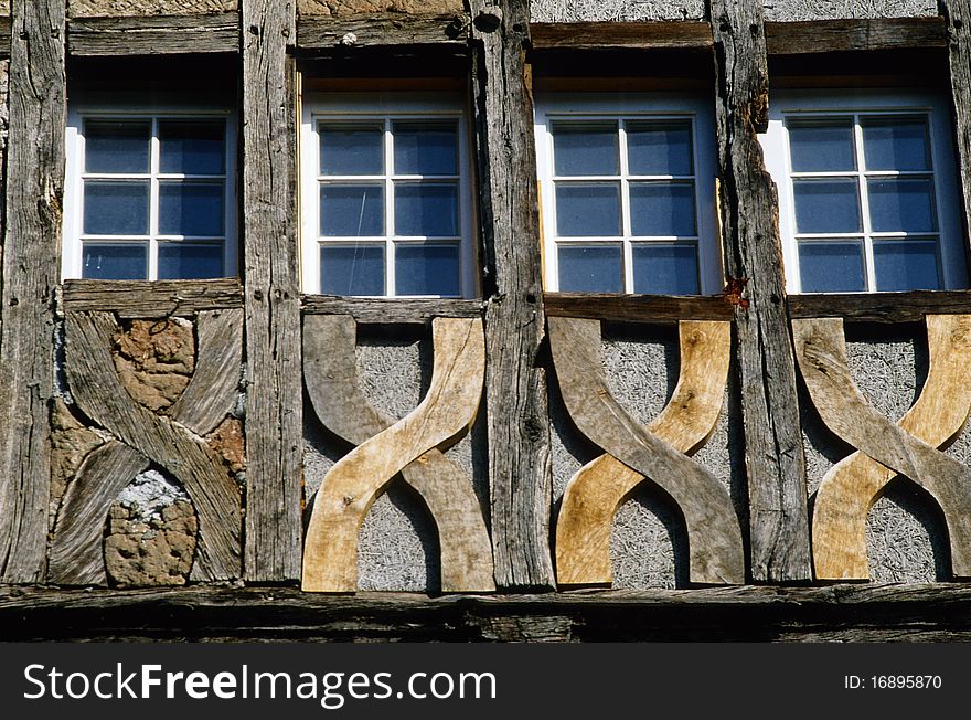 Four windows with x symbols made of wood at a carcass house. Four windows with x symbols made of wood at a carcass house