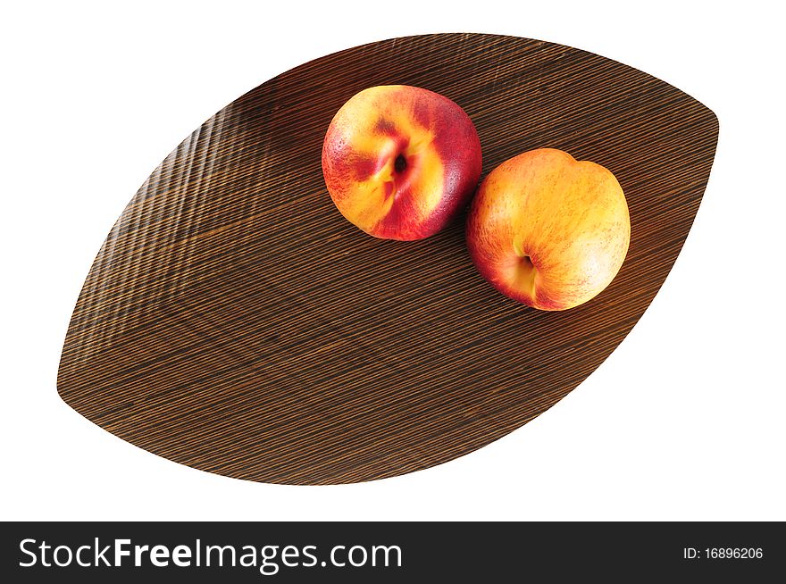 Peach on an wooden tray over white background. Peach on an wooden tray over white background.