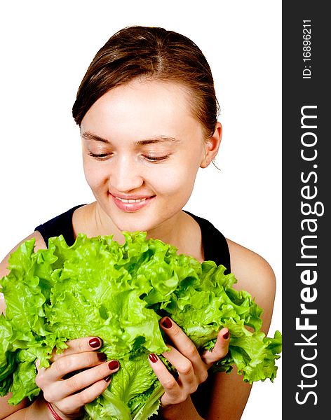 Smiling woman hold leaf lettuce isolated