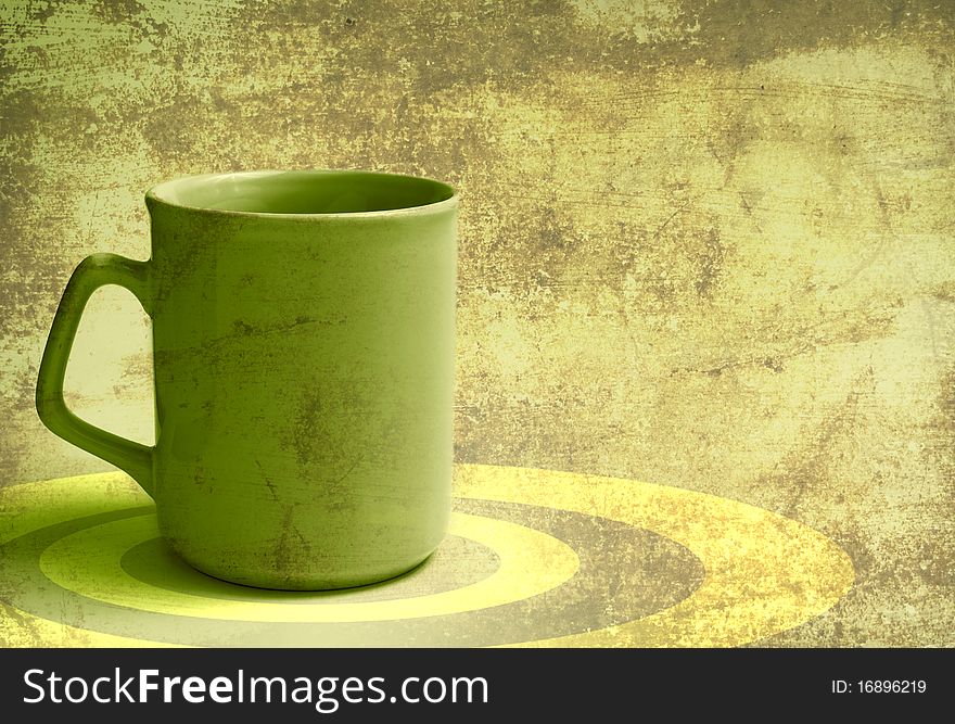 Empty cup on a light green background