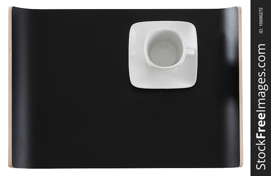 Empty coffee cup on a black tray. Empty coffee cup on a black tray.