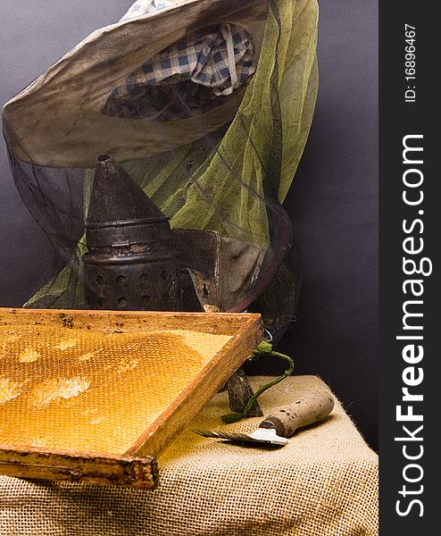 Basic attributes of every beekeeper placed on a black background in studio. Basic attributes of every beekeeper placed on a black background in studio