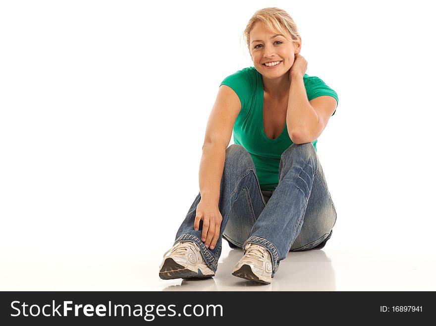 Casual young woman sitting smiling
