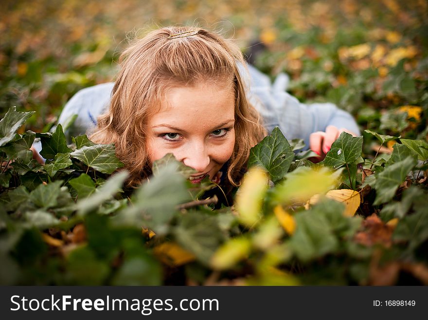 Girl In Autumn Park