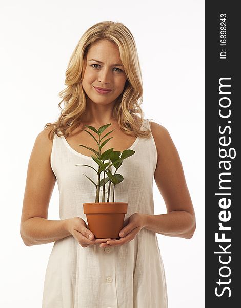 Woman holding potted plant