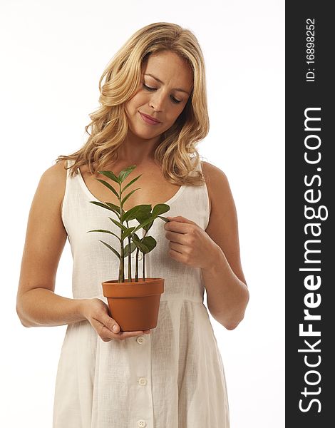 Woman holding potted plant