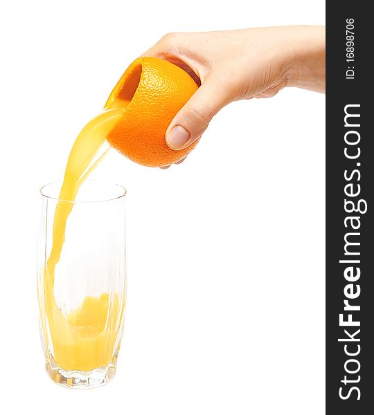 Glass of orange juice with fruit