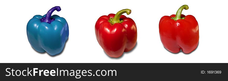 Three vivid colour peppers isolated on white background. Three vivid colour peppers isolated on white background