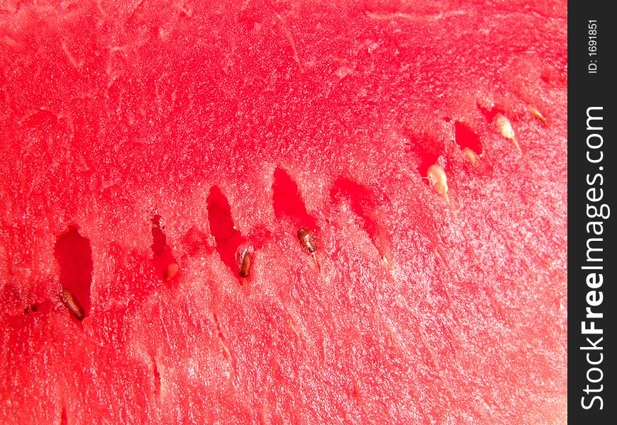 Juicy seedless watermelon fresh close up background. Juicy seedless watermelon fresh close up background