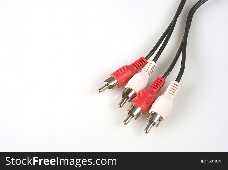 Red en white rca cable  connectors on a white background. Red en white rca cable  connectors on a white background