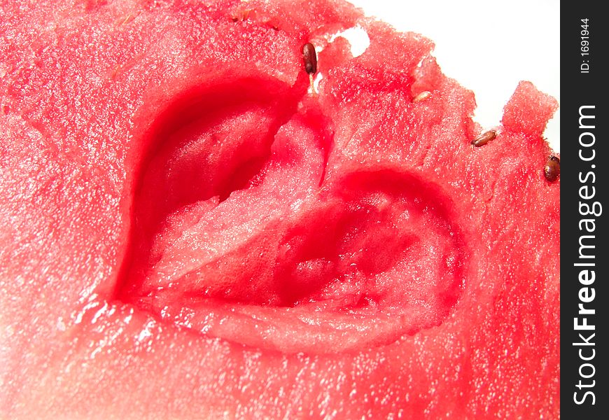 Juicy watermelon fresh close up with heart-shaped art. Juicy watermelon fresh close up with heart-shaped art