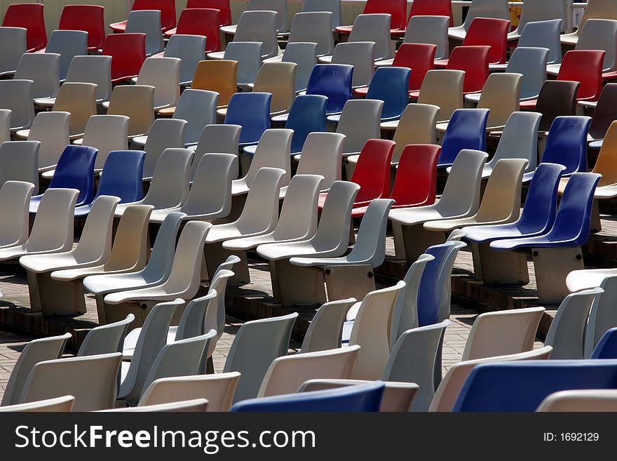 Colourful Empty Stadium Seats In Rows