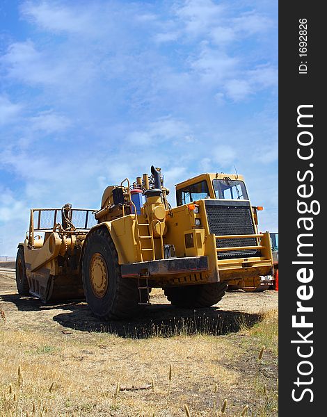 Large yellow earth moving equipment. Large yellow earth moving equipment