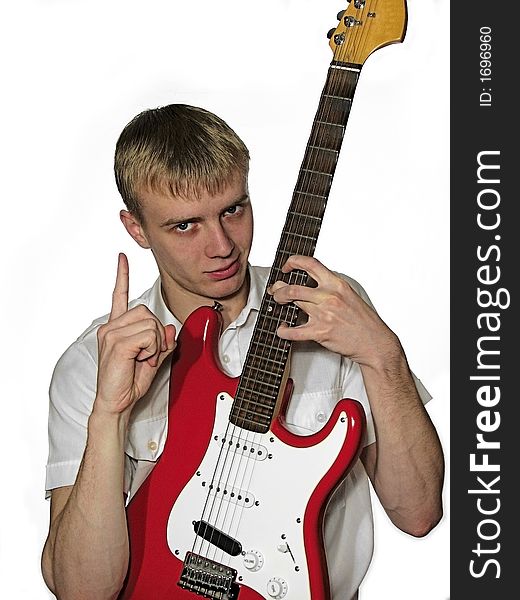 Guy blonde with a red guitar fender. Guy blonde with a red guitar fender