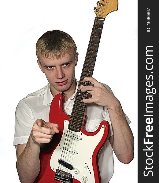 Guy blonde with a red guitar. Guy blonde with a red guitar