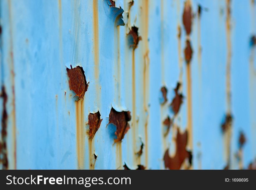 Rusty surface with old paint