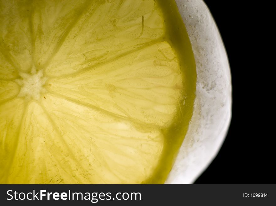 Yellow lemon with sun reflection