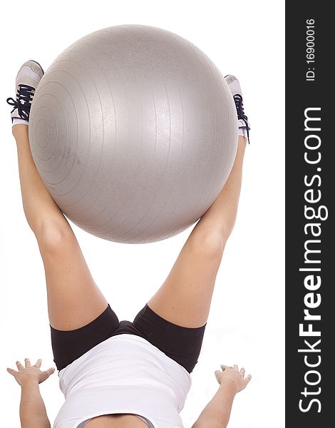 Holding fitness ball with legs