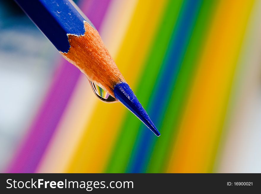 Color pencils arrange on spectrum background. Color pencils arrange on spectrum background