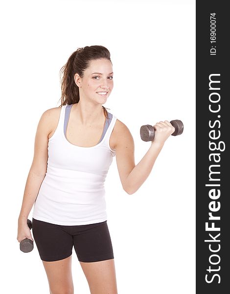 A woman is lifting some weights and wearing shorts and a tank top. A woman is lifting some weights and wearing shorts and a tank top.