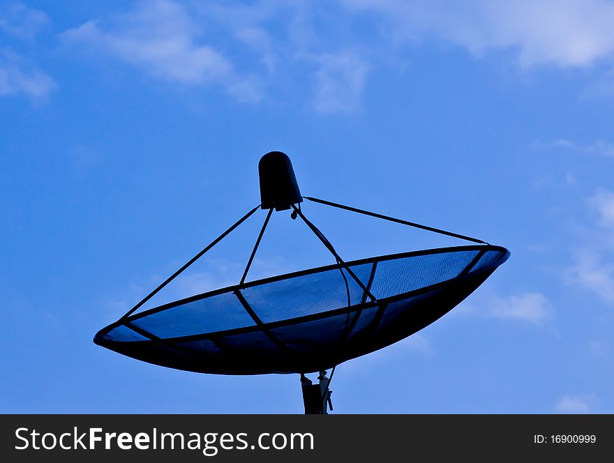 Black satellite dish and blue sky in the fresh morning