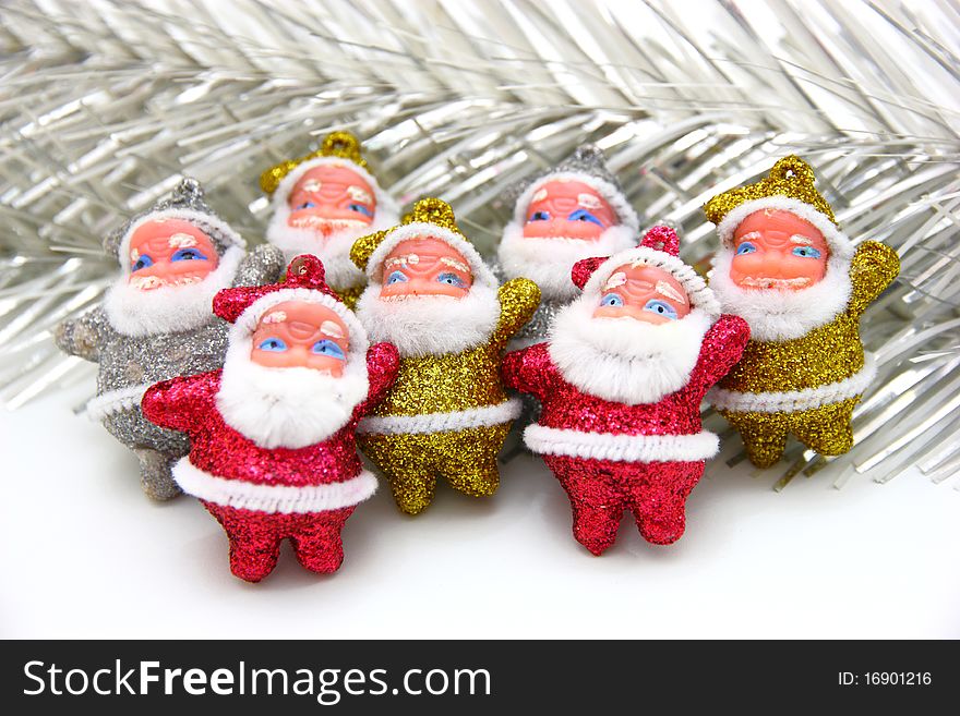 Some Dolls Of Santa Claus Are Together