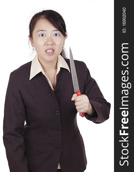 An angry Asian businesswoman holding a knife. An angry Asian businesswoman holding a knife