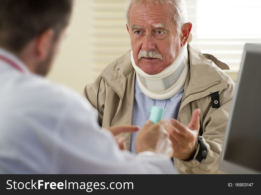 Senior man at the doctor, selective focus