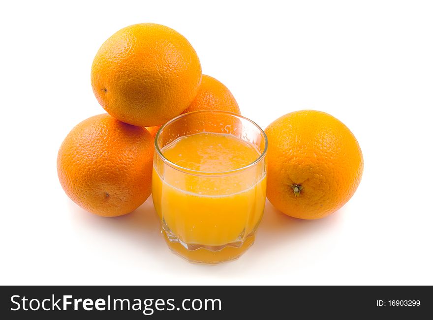 Orange juice and orange fruit on white