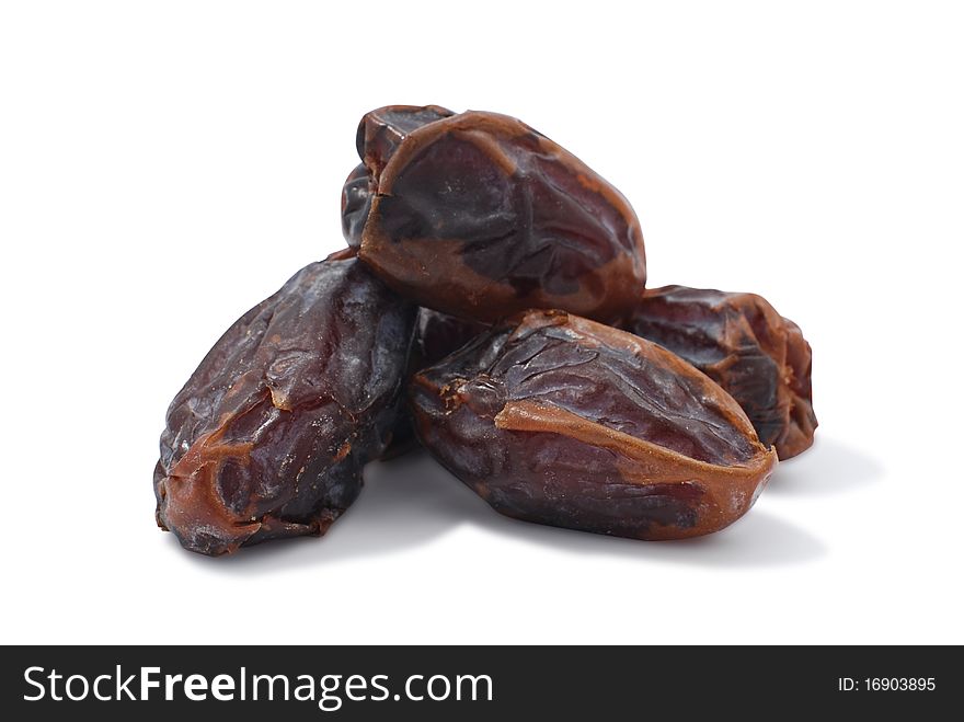 Large dried dates on the isolated background