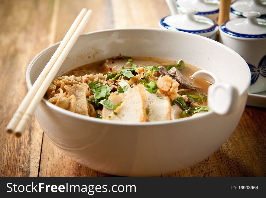 Bowl of thai style beef noodle soup. Bowl of thai style beef noodle soup.