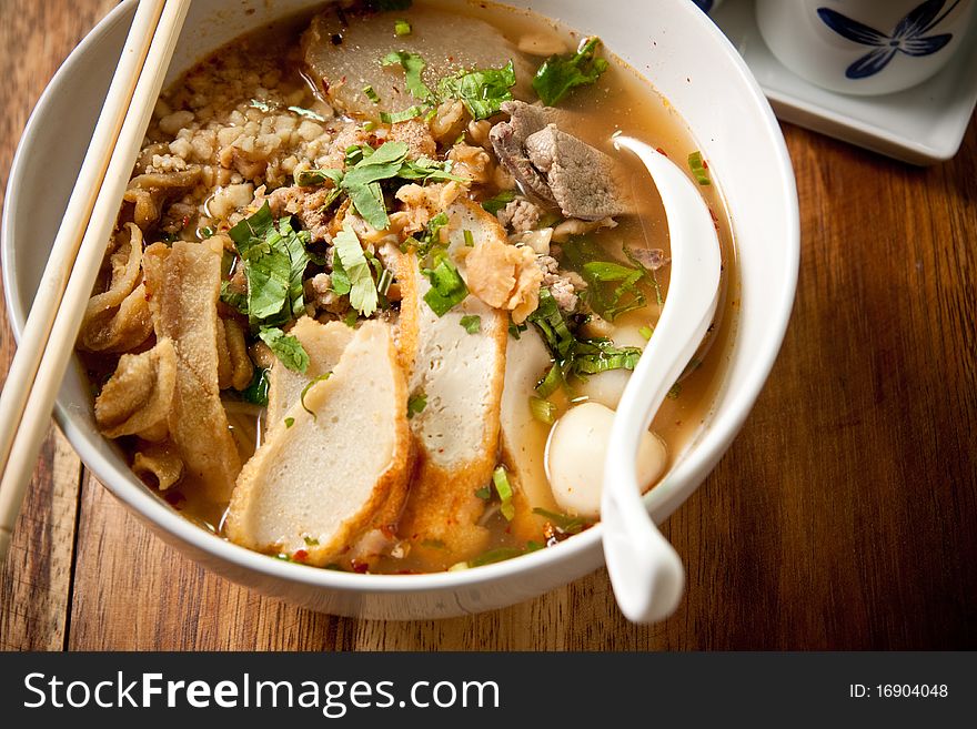 Bowl of thai style beef noodle soup. Bowl of thai style beef noodle soup.