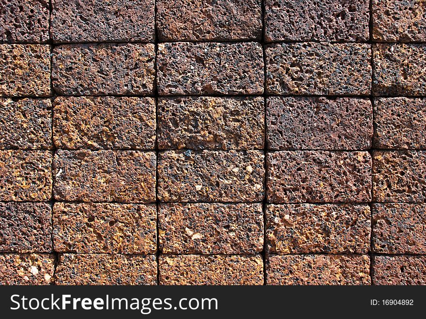 Brick brown wall stone in sunday. Brick brown wall stone in sunday.