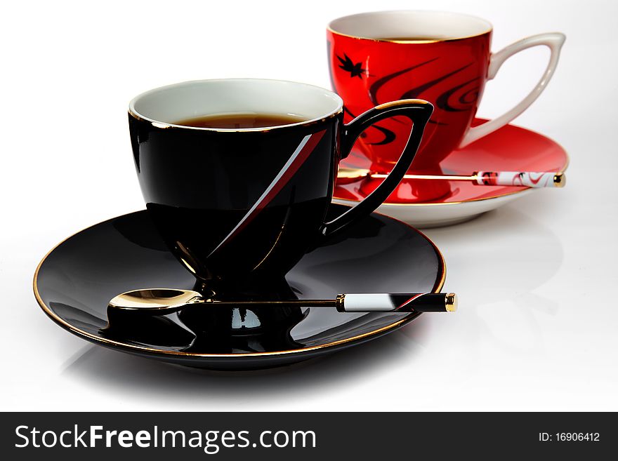 Two cups of tea on a gray background. Two cups of tea on a gray background