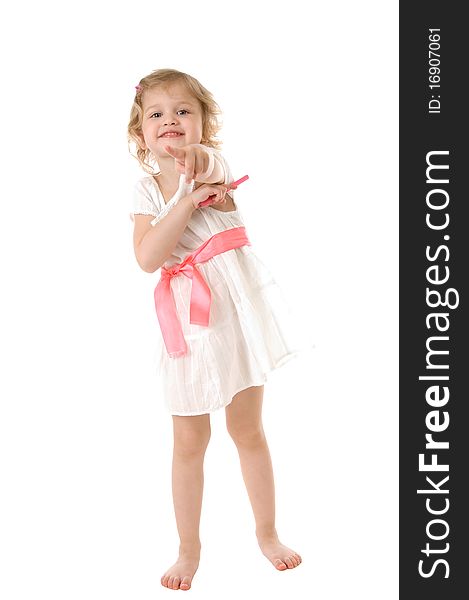 Amazed little girl wearing a white dress standing on white background