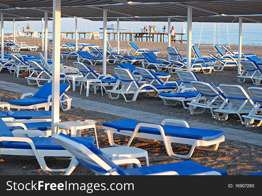 Beach with lot of empty lounge. Beach with lot of empty lounge