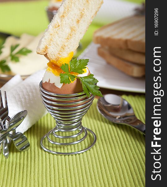 Dipping Roasted Toast In Soft Boiled Egg