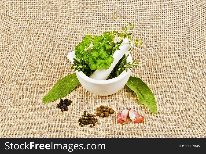 Ceramic pestle of thym, parsley, and rosemary. Ceramic pestle of thym, parsley, and rosemary