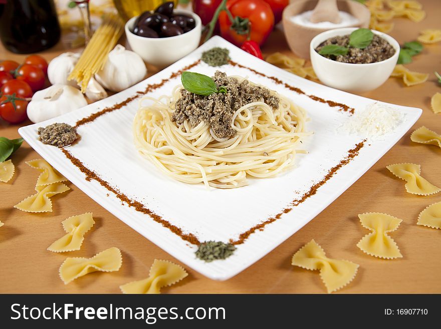 Delicious pasta with pumpkin pesto on a decorated plate