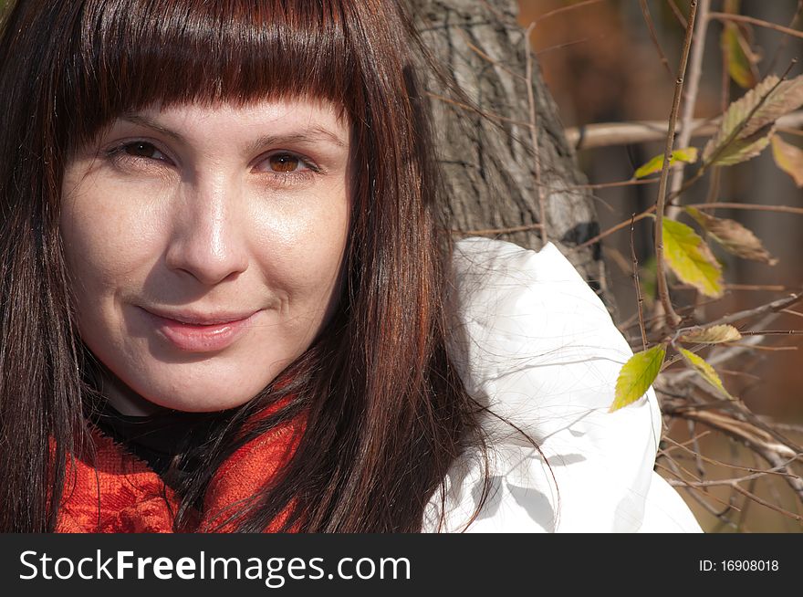 Young beautiful romantic woman in the forest