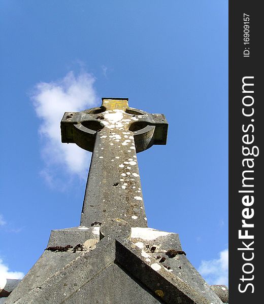 View from bottom to top of a stone, celtic high cross.