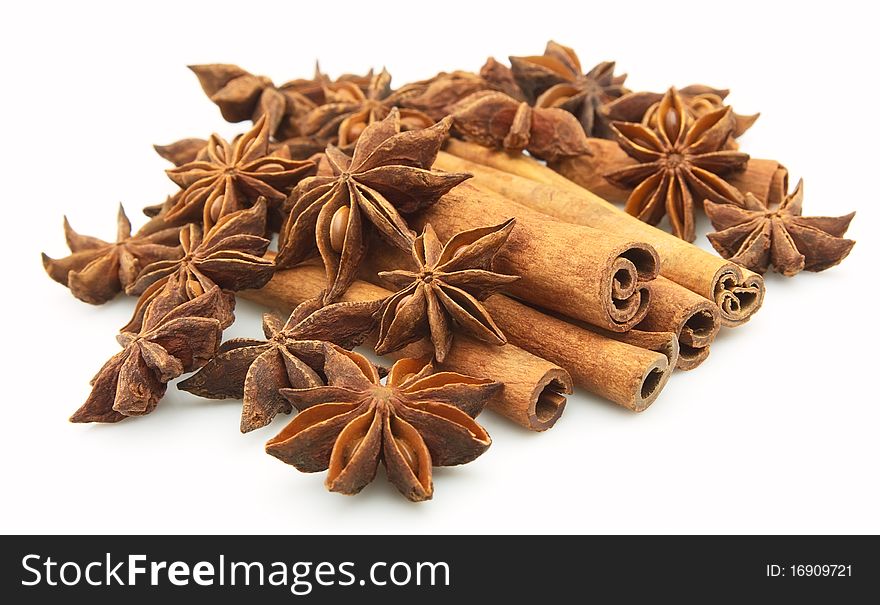 Anise and cinnamon on a white background