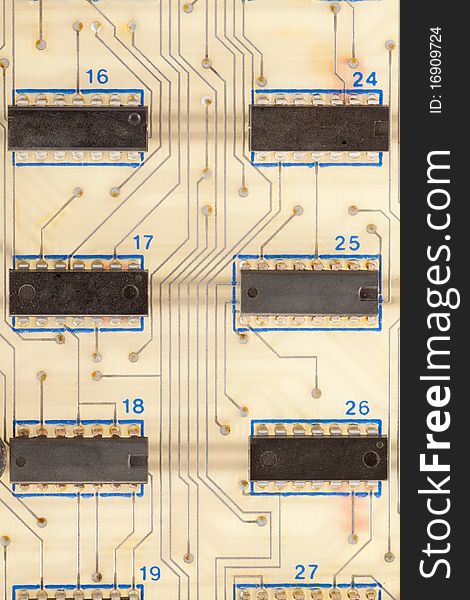 An old computer board with chips