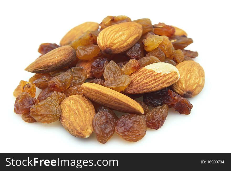 Small group of raisin with almonds on a white background. Small group of raisin with almonds on a white background