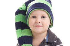 Child In A Green Cap On A White Background Royalty Free Stock Photo