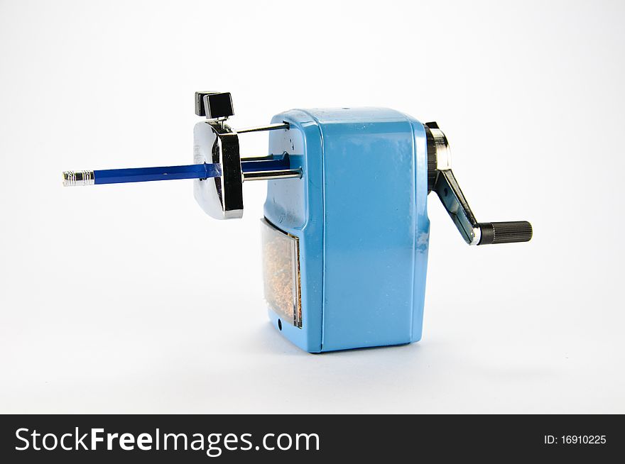 Blue pencil sharpener on white background