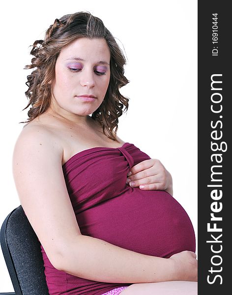 Pregnant woman holding belly with arms. Pregnant woman holding belly with arms