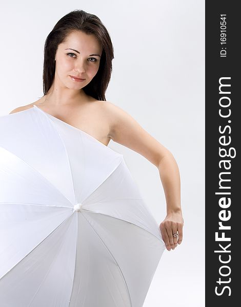 Portrait of a pretty girl with umbrella