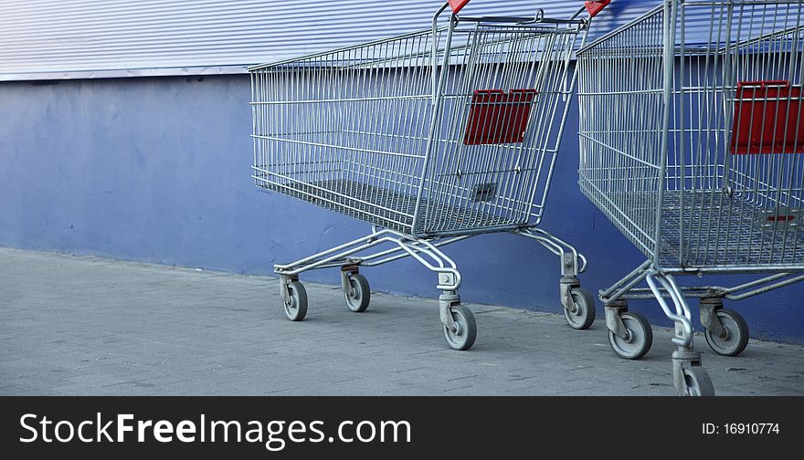 Shopping carts, basket, outdoor blue background